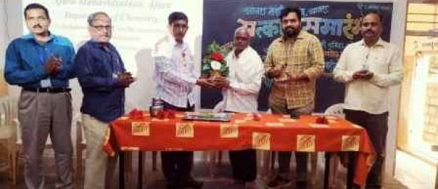 Principal, Dr. A. N. Sadale  felicitating, Lab. Attendant, Shri. Samindar Manolkar on occasion of the voluntary Retirement.